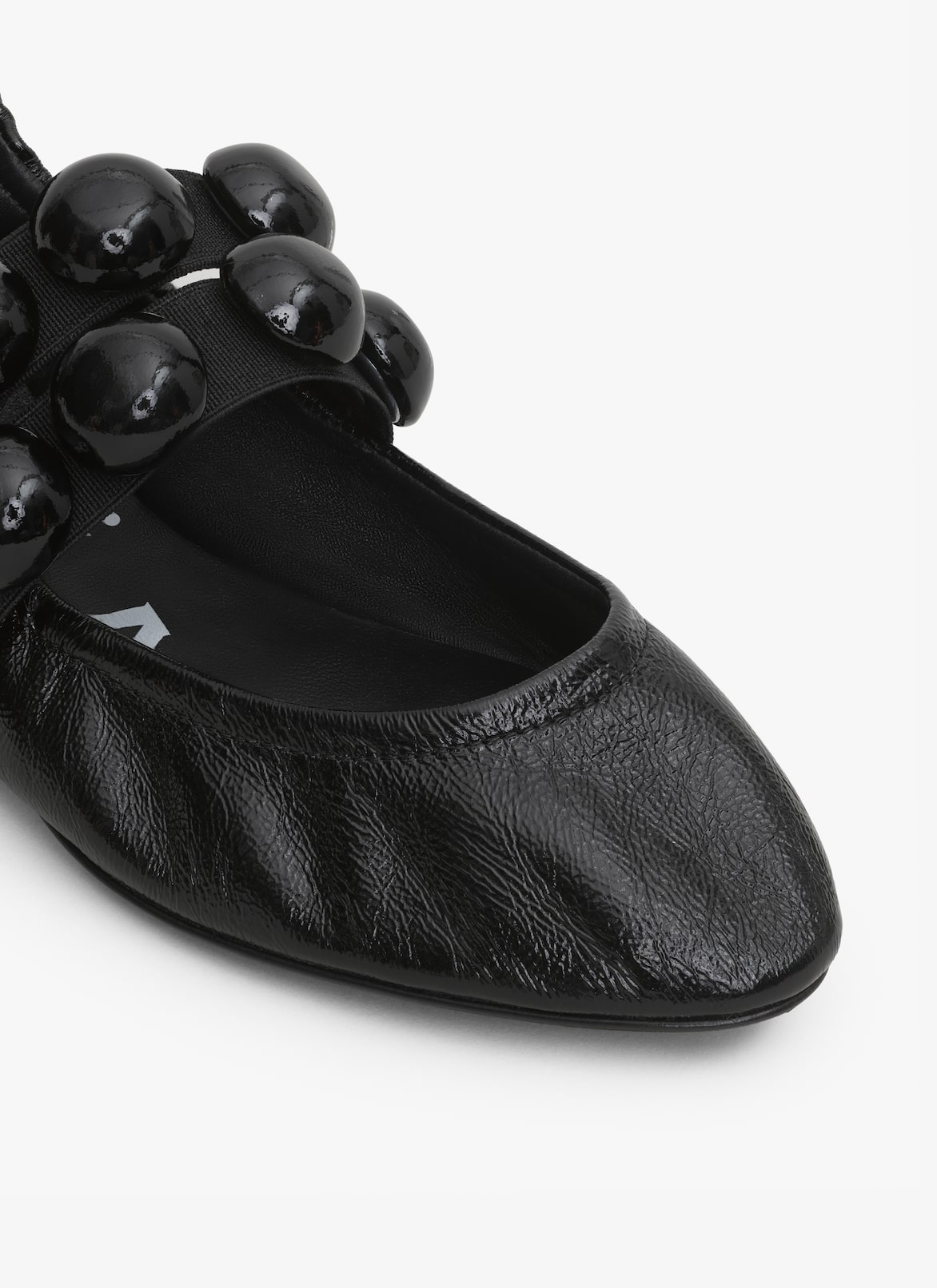SPHERE BALLET FLATS IN PATENT LEATHER ALAÏA BLACK SPHERE BALLET FLATS IN PATENT LEATHER